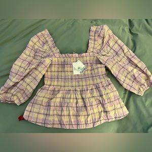 Ganni off shoulder ruffled top